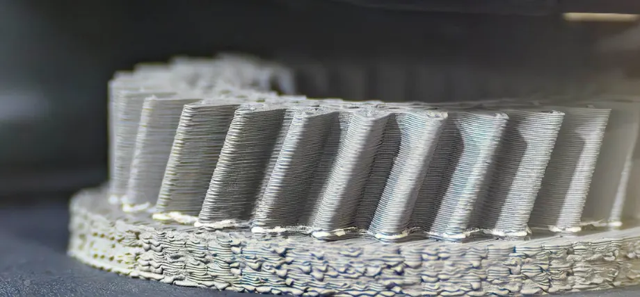 close up of 3D printed turbine part, plastic with base layer 