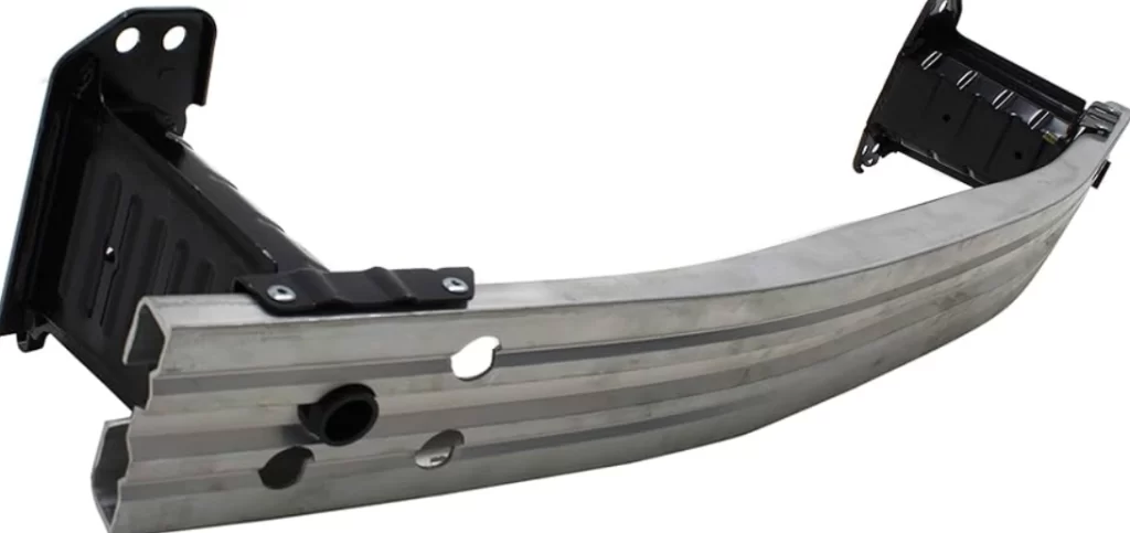 Aluminum automotive front bumper reinforcement bar with black mounting brackets and impact absorption design