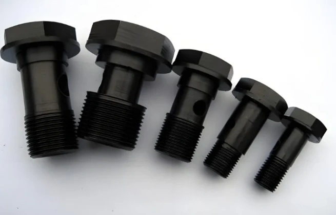 Five black arbor bolts of different sizes arranged side by side