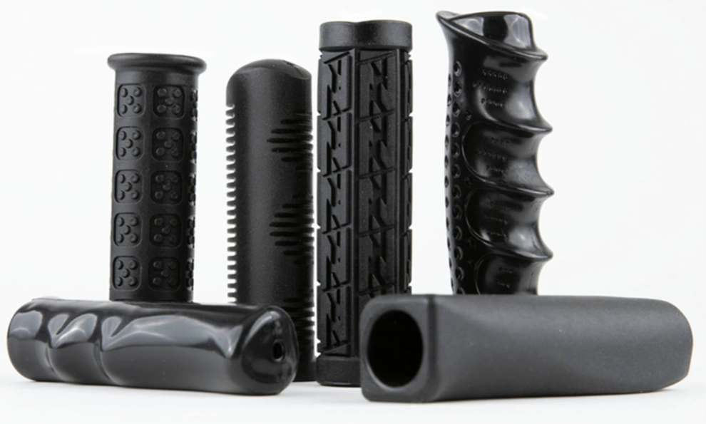 A close-up image of different designs of black bike handlebars made by plastic injection molding