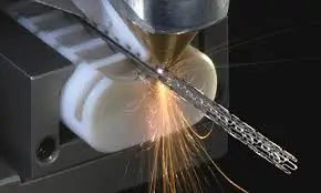 Laser cutting a metal stent for medical device manufacturing