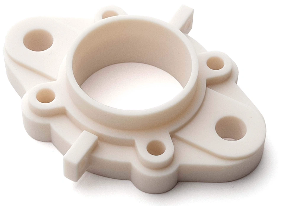 White 3D printed mechanical flange with central bore and mounting holes for rapid prototype testing