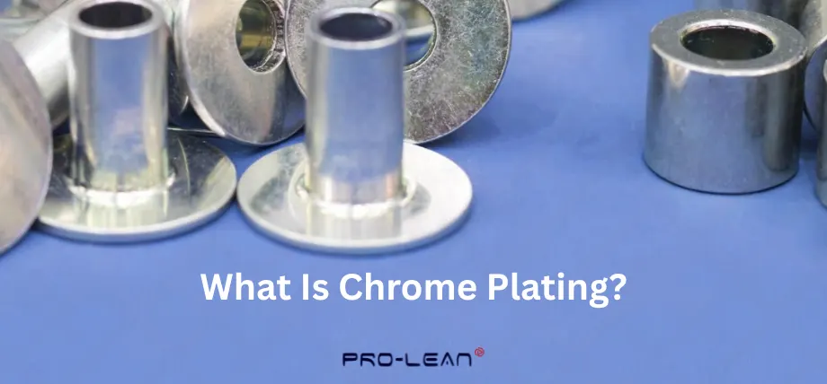 Many chrome plated circular rivets/pins on a blue sheet