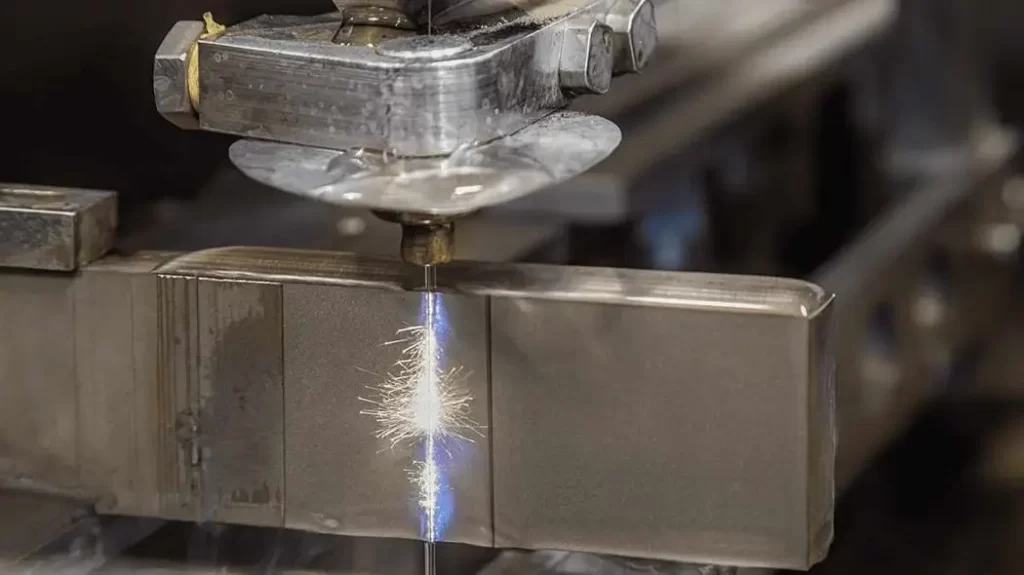 An image showing a Wire metal cutting process making crisp, precise cuts