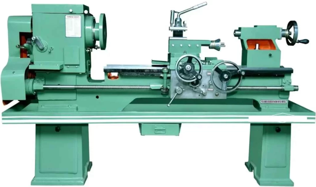 Green manual lathe machine mounted on a sturdy base