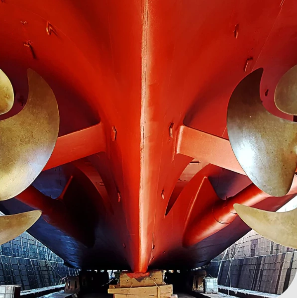 Marine-grade bronze propellers and red anti-fouling hull coating  