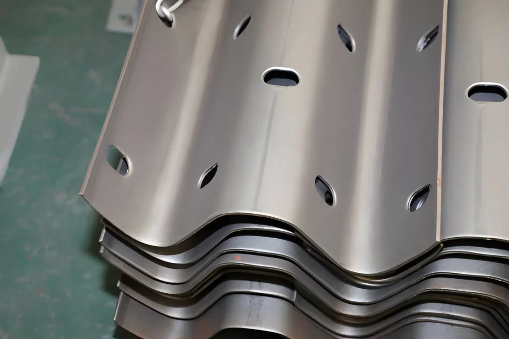 Several custom-fabricated sheet metal parts with precise dimensions and evenly spaced holes.