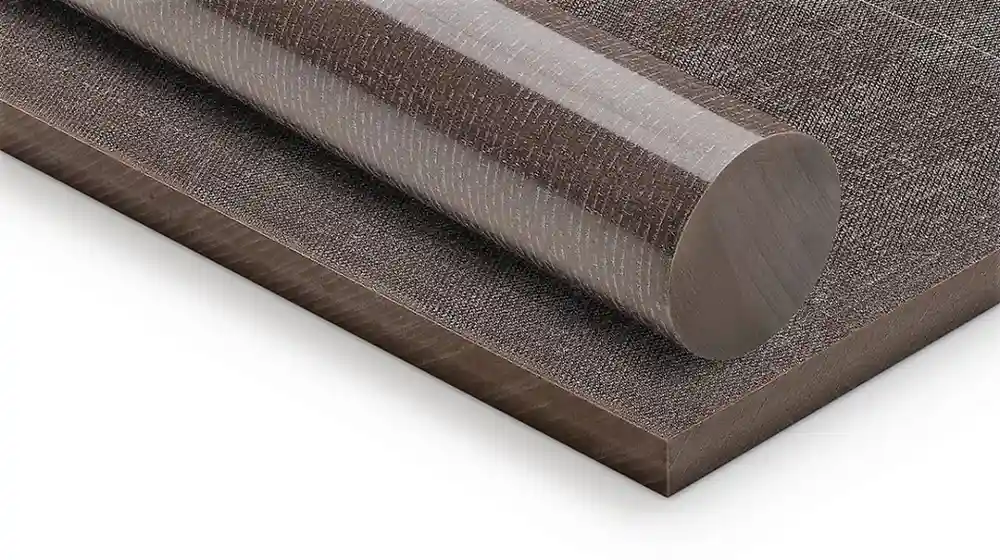 The image shows a close-up of a Delrin sheet and rod.