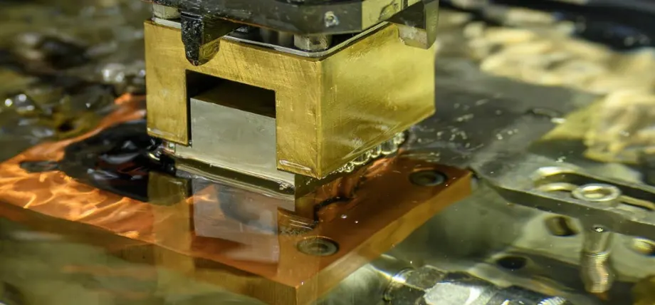 EDM machine working with liquid coolant method by copper electrode