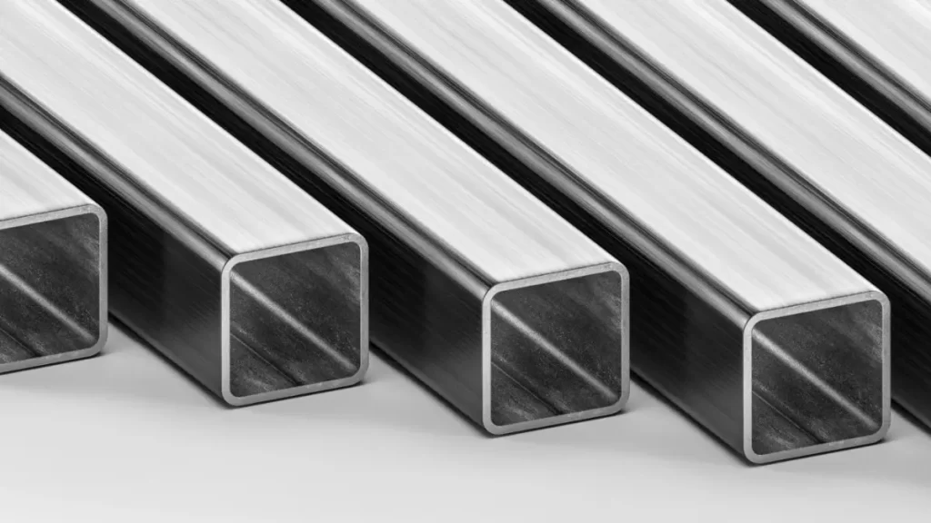 Several ferritic stainless steel bars are displayed in a clean arrangement. The bars have a duller, matte metallic finish.