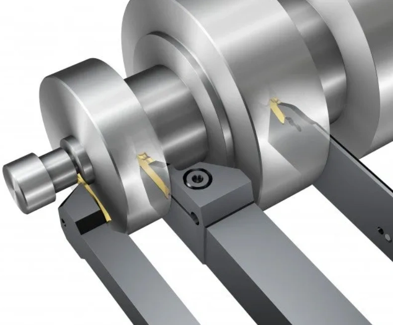 A closeup diagram of CNC grooving showing three types of grooving tools at different sections of a cylindrical workpiece