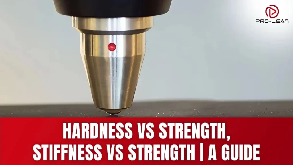 Close-up of material testing probe with red light.