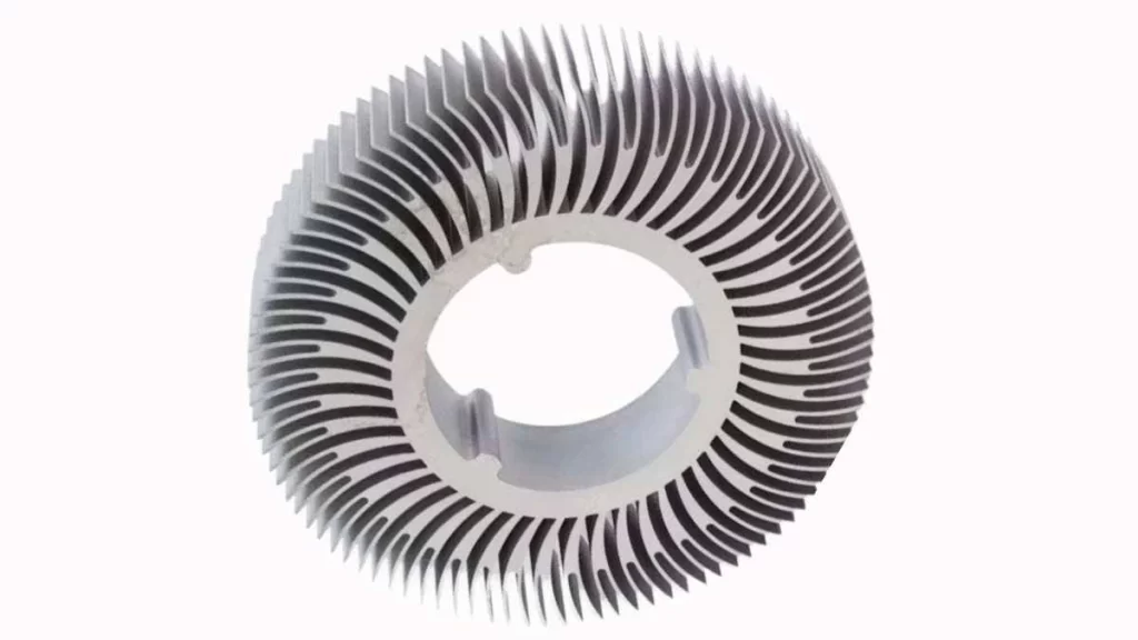 An image showcasing a highly detailed Wire EDM-cut stainless steel part with sharp, precise blade-like edges