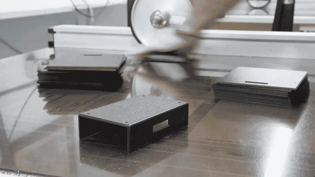 Image shows a medical prototype placed near a grinder after finishing.