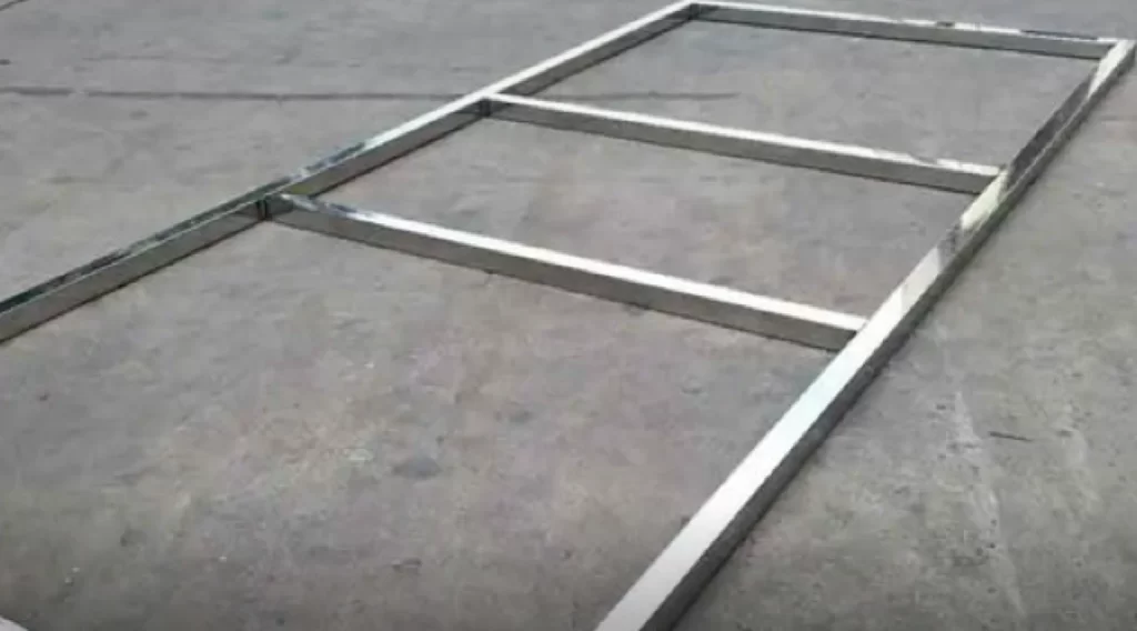 Polished stainless steel sheet metal door frame with cross supports