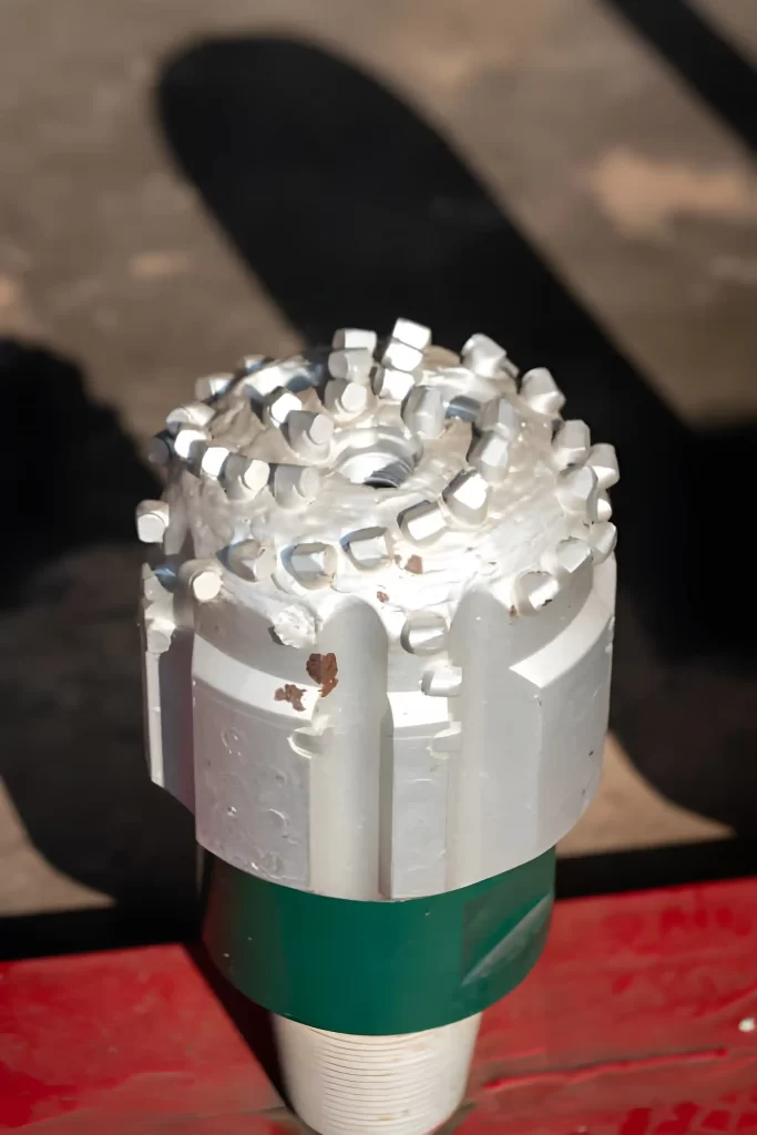 The image of a Polycrystalline Carbide Drill Bit on the worktable.