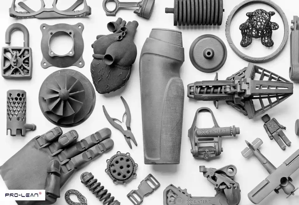 Assortment of intricate gray parts made with SLS technology.