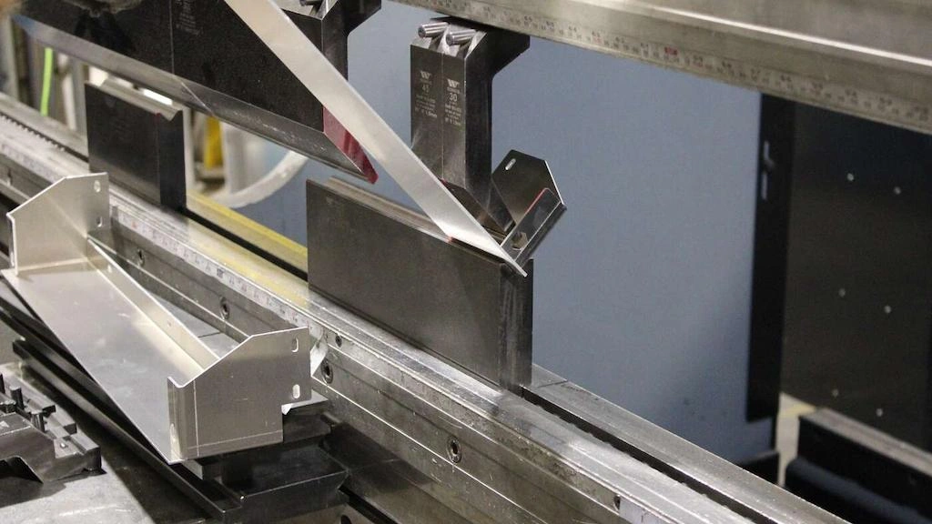 A close-up view of steel bending and forming