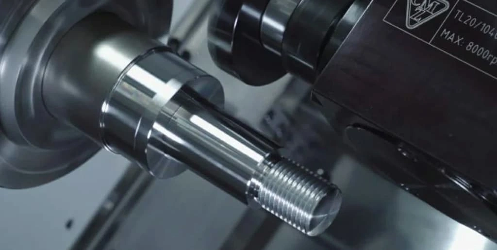 A close-up view of step turning, workpiece attached to the chuck 