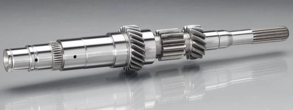 Precision-machined metal transmission shaft with gears produced by CNC turning